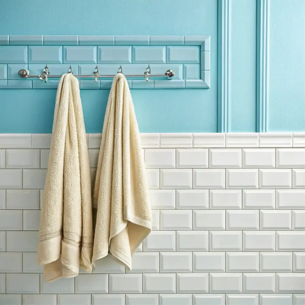 "Bright, light paint colors create the illusion of space in small, windowless bathrooms."